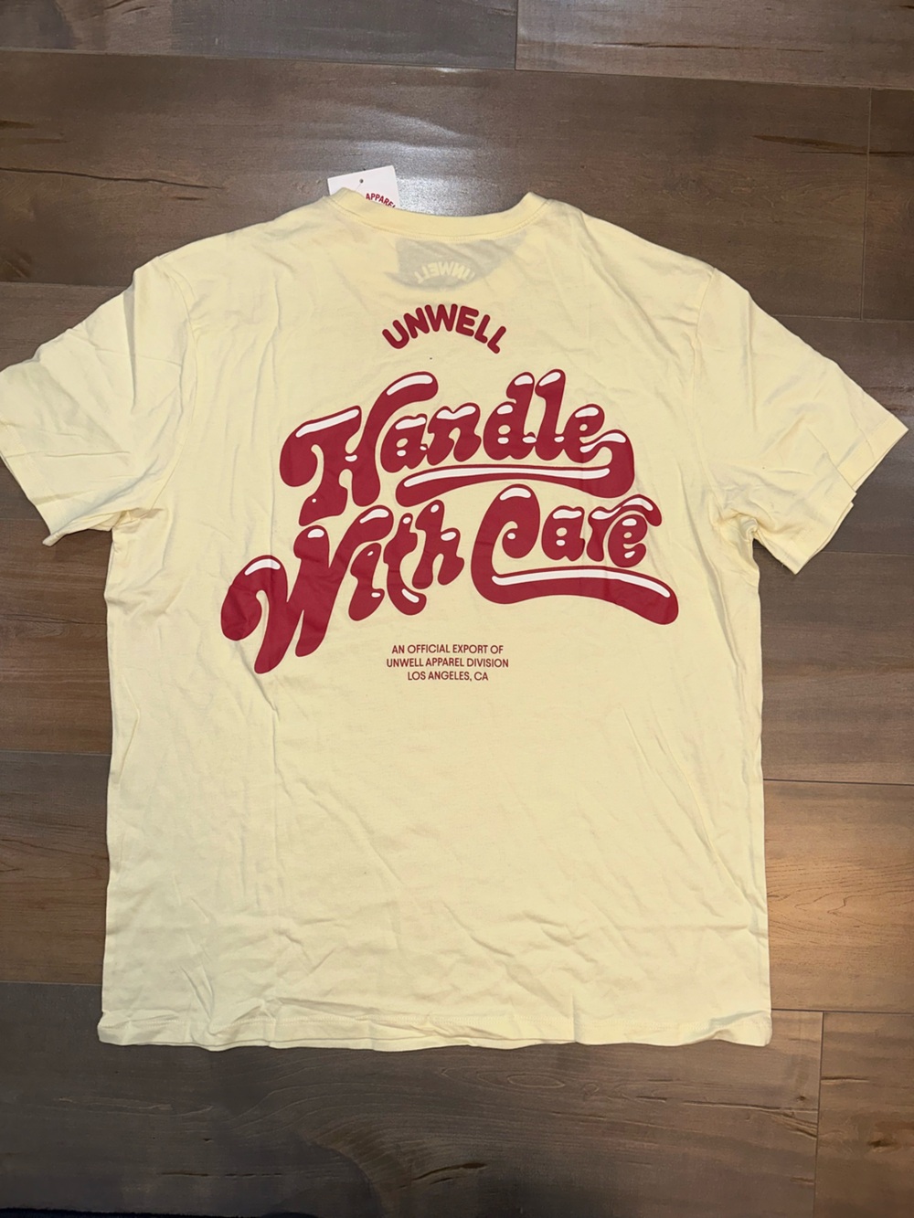 Unwell Women's Pale Yellow Short-Sleeve Logo Tee